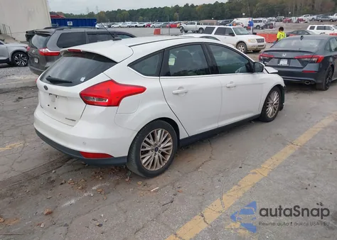 2016 Ford Focus Titanium z USA, uszkodzony, nr VIN 1FADP3N26GL222971